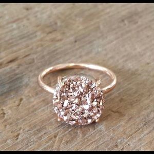 Rose gold solitaire ring.